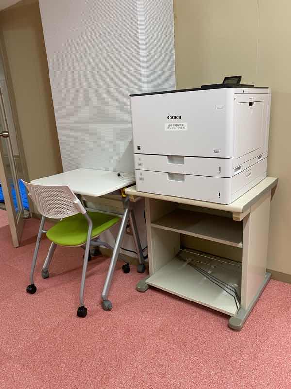 LBP861C next to the door of Classroom B”width=